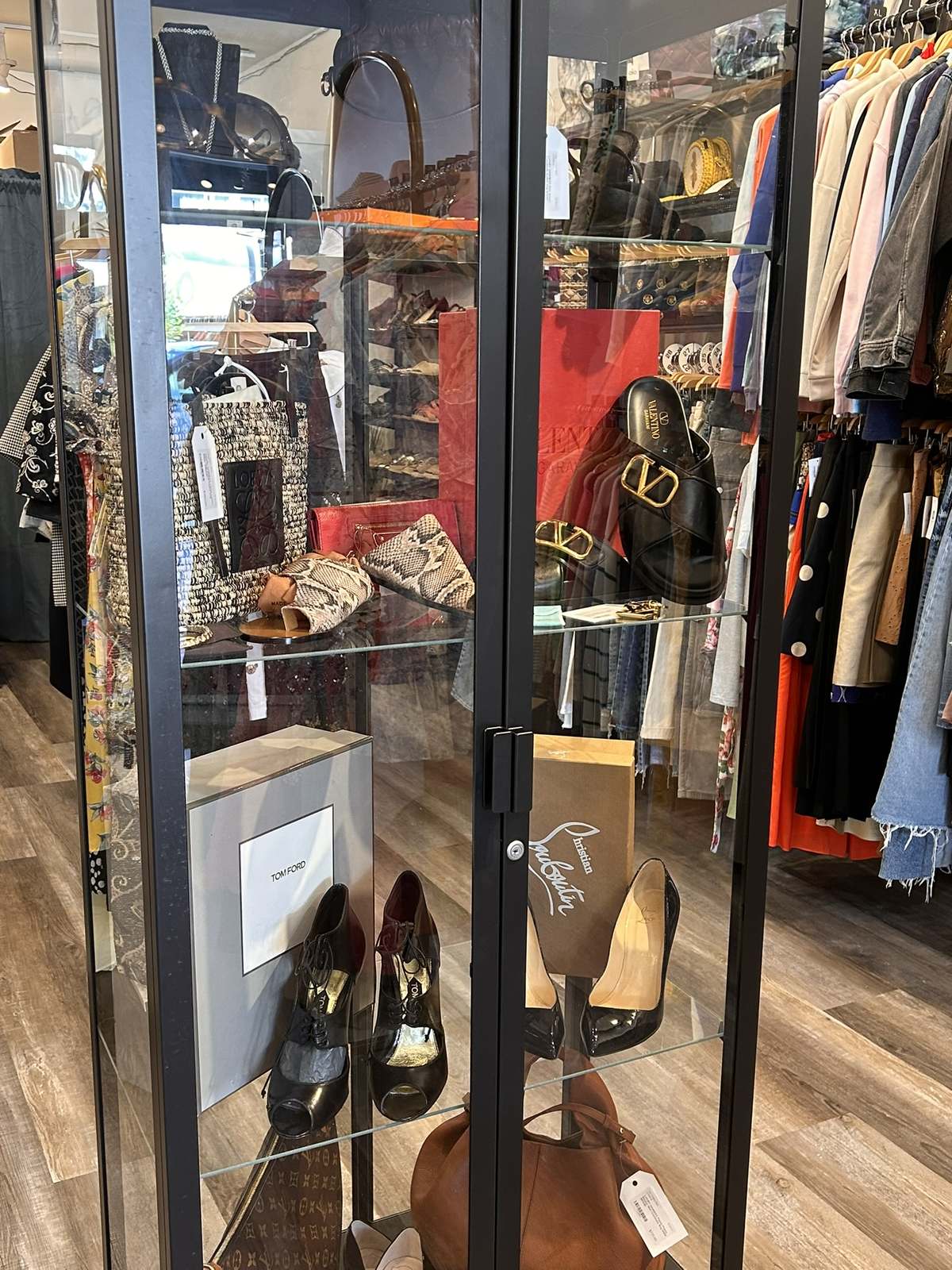 The authenticated case at The Clothes Nest — Valentino, Tom Ford, Christian Louboutin and Loewe.