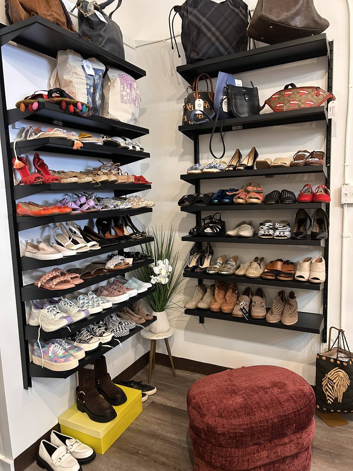 The shoe wall at The Clothes Nest, floor to ceiling.